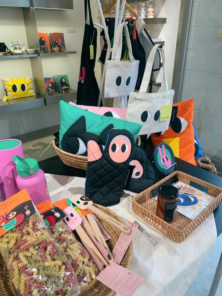 looking at the colorful character products in the store.