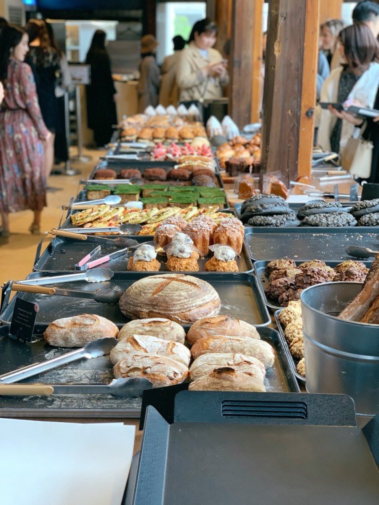 A wide variety of artisanal pastries displayed inside the Hanok cafe.