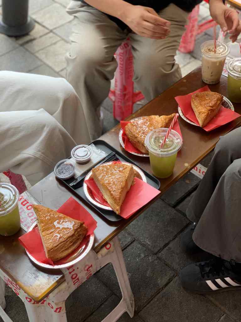 A large, crispy strawberry pastry pizza, the signature menu at Cafe Onion.