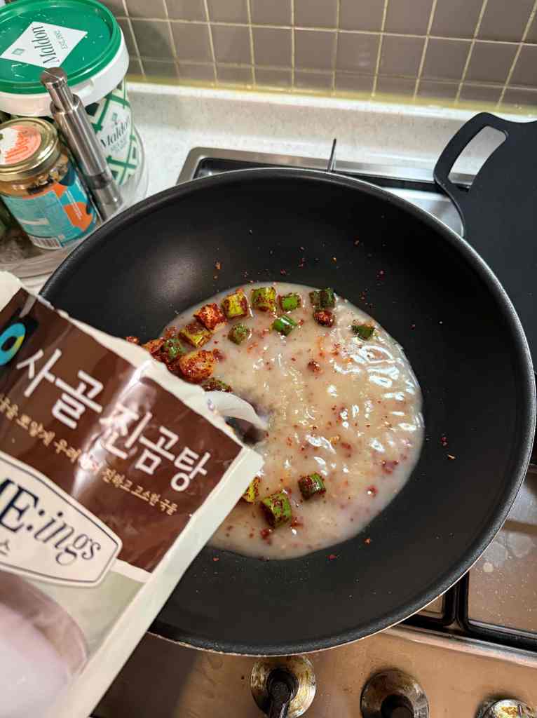 Home-Cooking-Spicy-Dumpling-Stew-Prep-boiling-broth.jpg