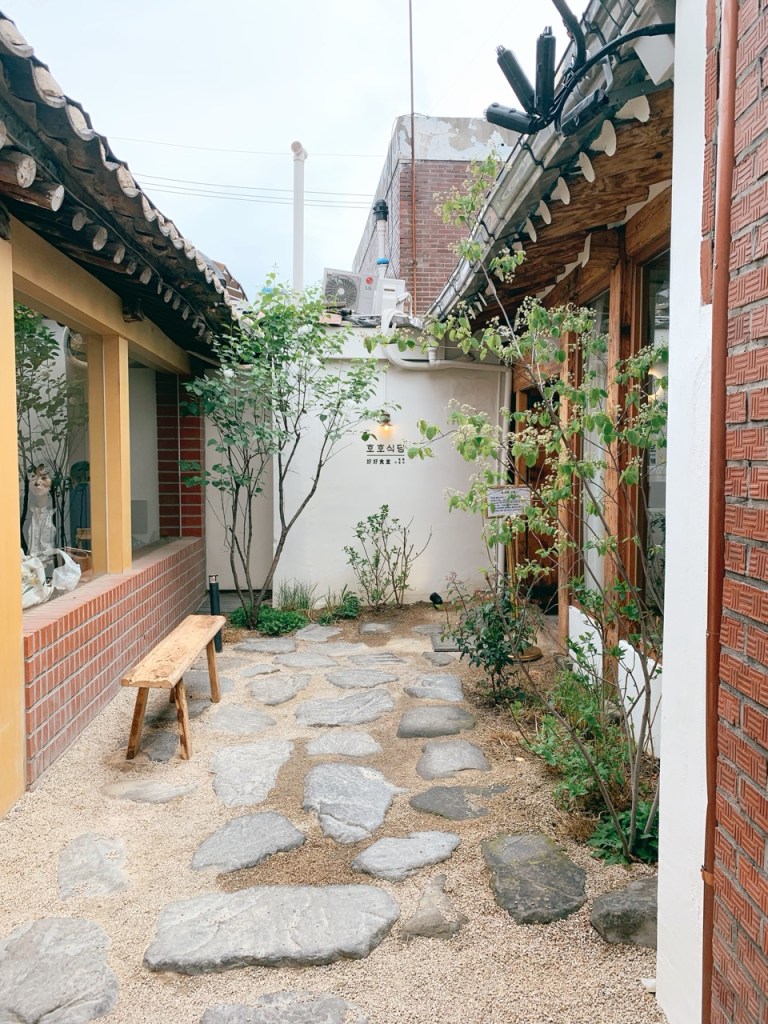 The beautiful Hanok entrance and courtyard of Hoho Sikdang in Ikseon-dong.