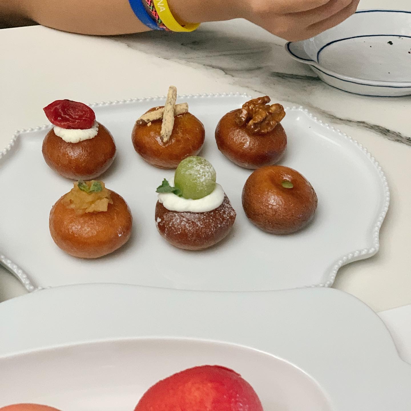 Traditional Gaeseong Juak served on a contemporary ceramic plate.