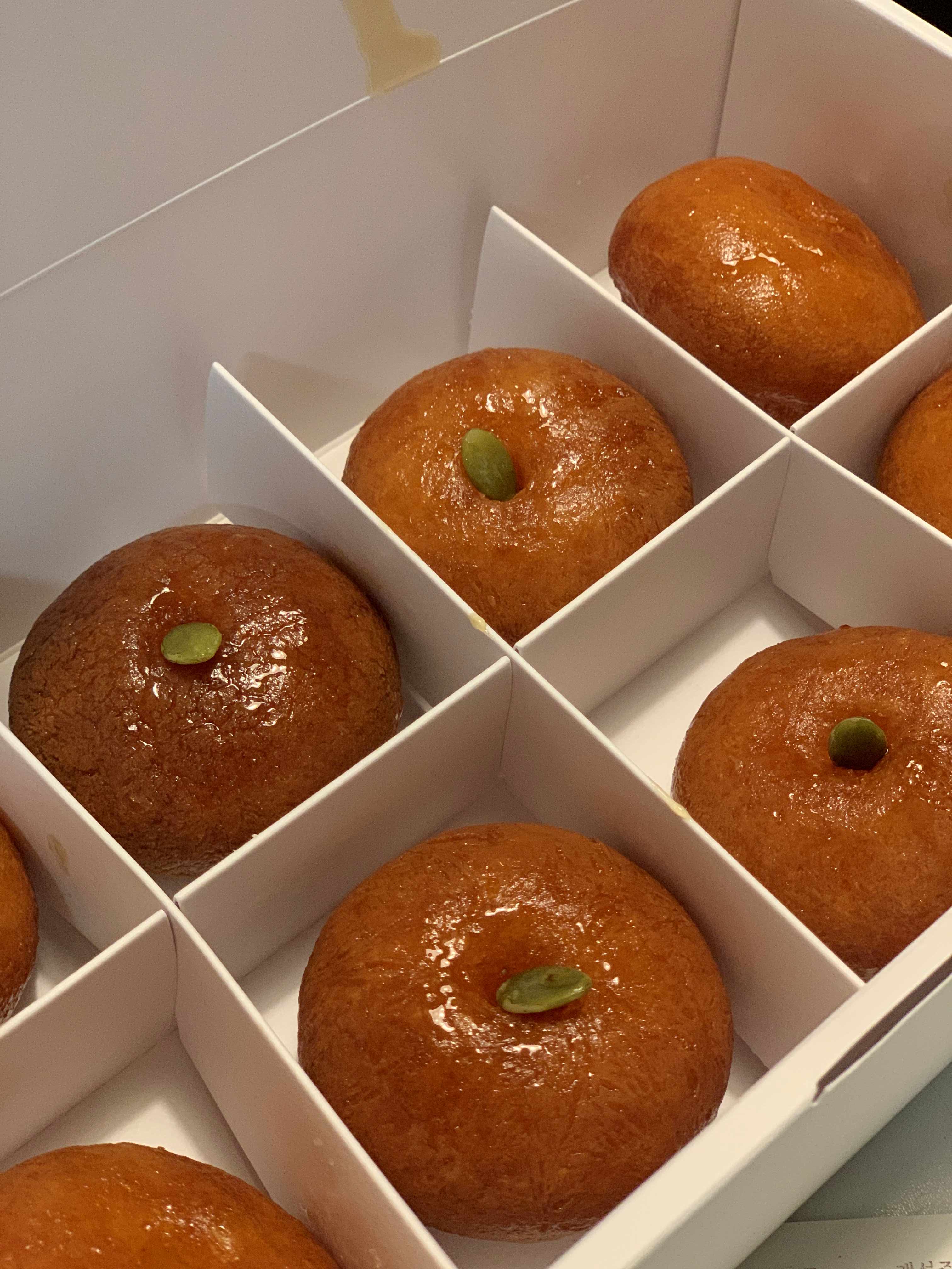 Close-up of the cute and perfectly round handmade Juak doughnuts.