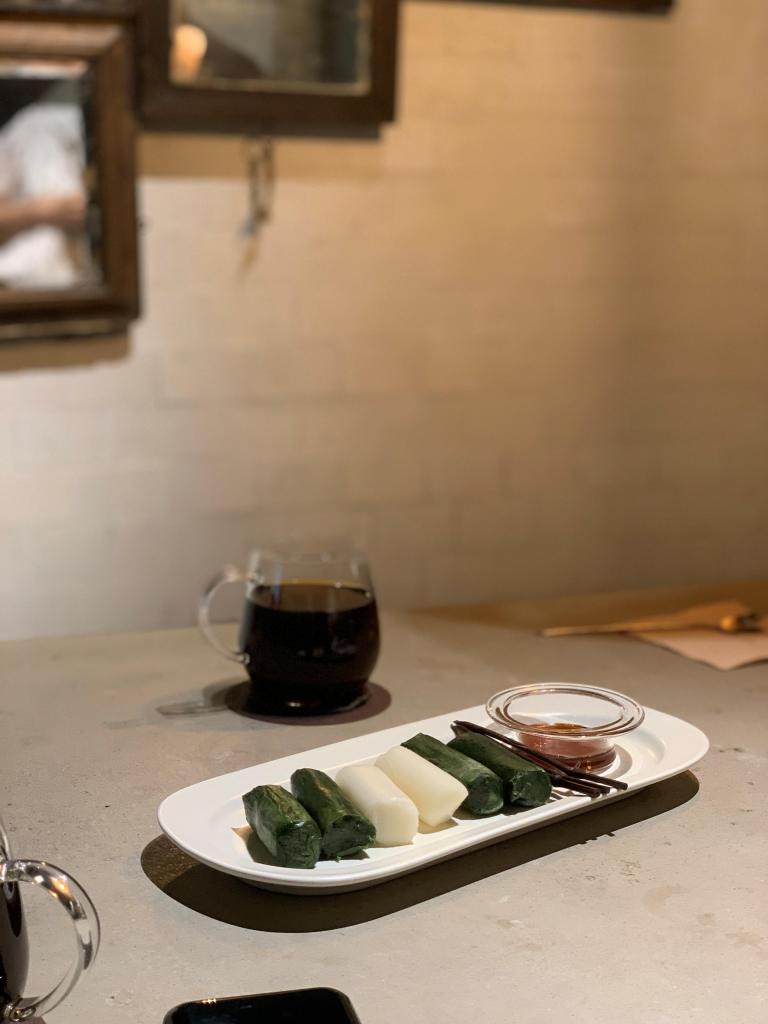 A grilled rice cake dipped in sweet Korean grain syrup (Jocheong).