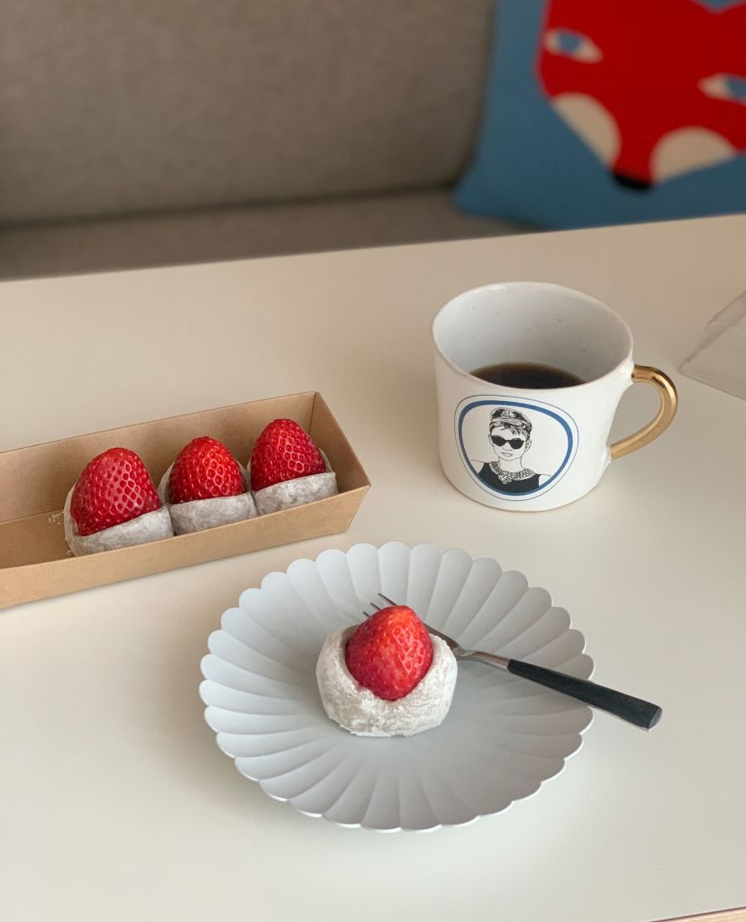 Beautifully arranged Korean strawberry mochi with fresh berries.