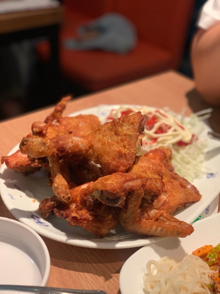 Freshly fried golden brown chicken with a very crunchy exterior.