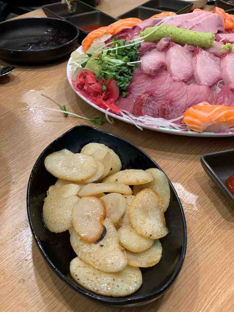 A side platter of fresh sea squirts, abalone, and sea cucumbers.