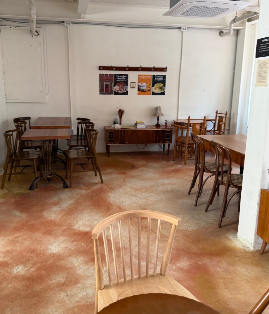 The warm and cozy wooden interior design of 5 to 7 cafe.