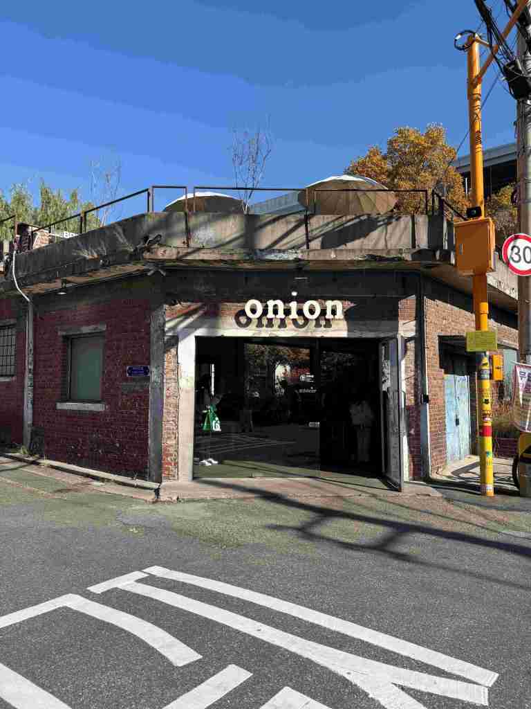 The iconic industrial exterior of Cafe Onion Seongsu, a renovated factory.