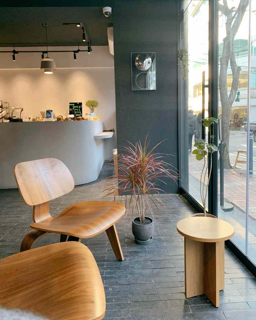 The sleek and moody interior atmosphere of Iridescent cafe.