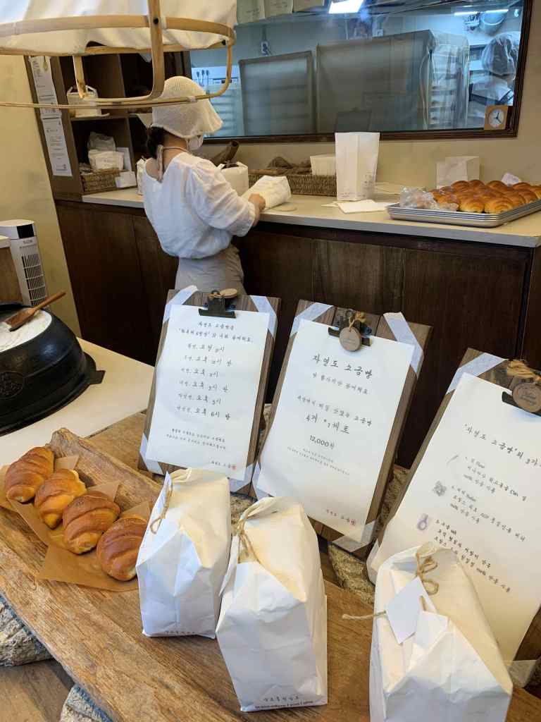 The signature eco-friendly paper bag packaging of Jayeondo Salt Bread.