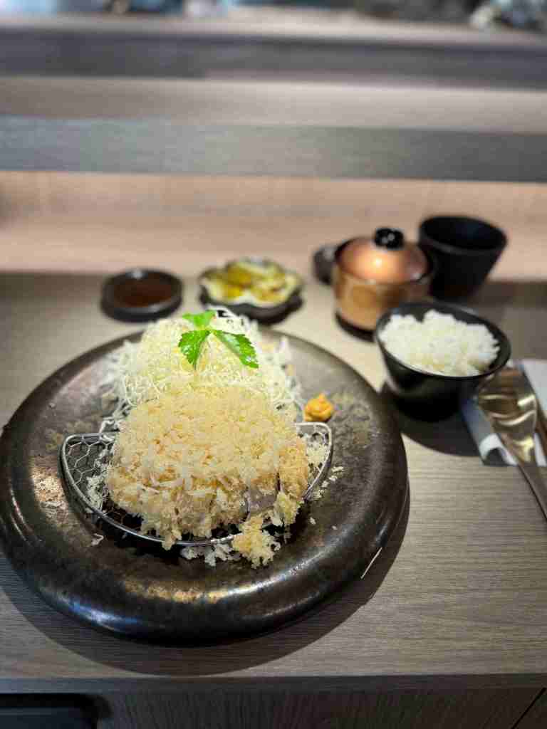 Flavorful Rosu-katsu (pork loin) featuring a perfect ratio of meat and fat.