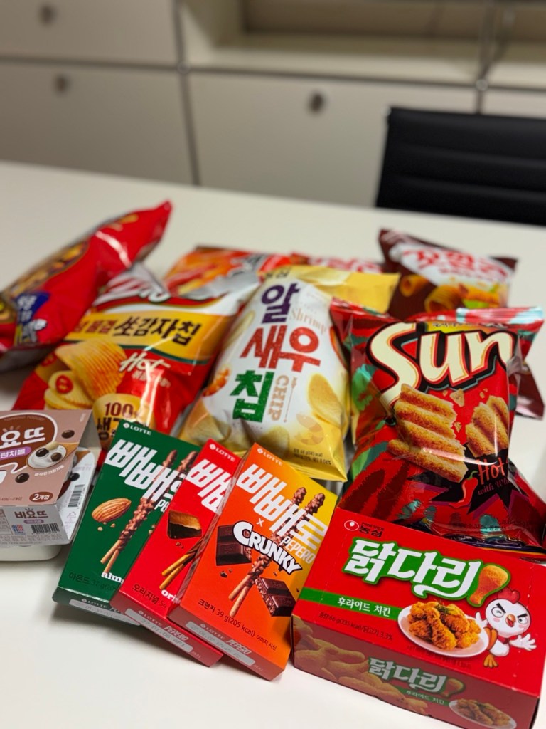 A representative shot of a successful snack shopping haul with various bags.