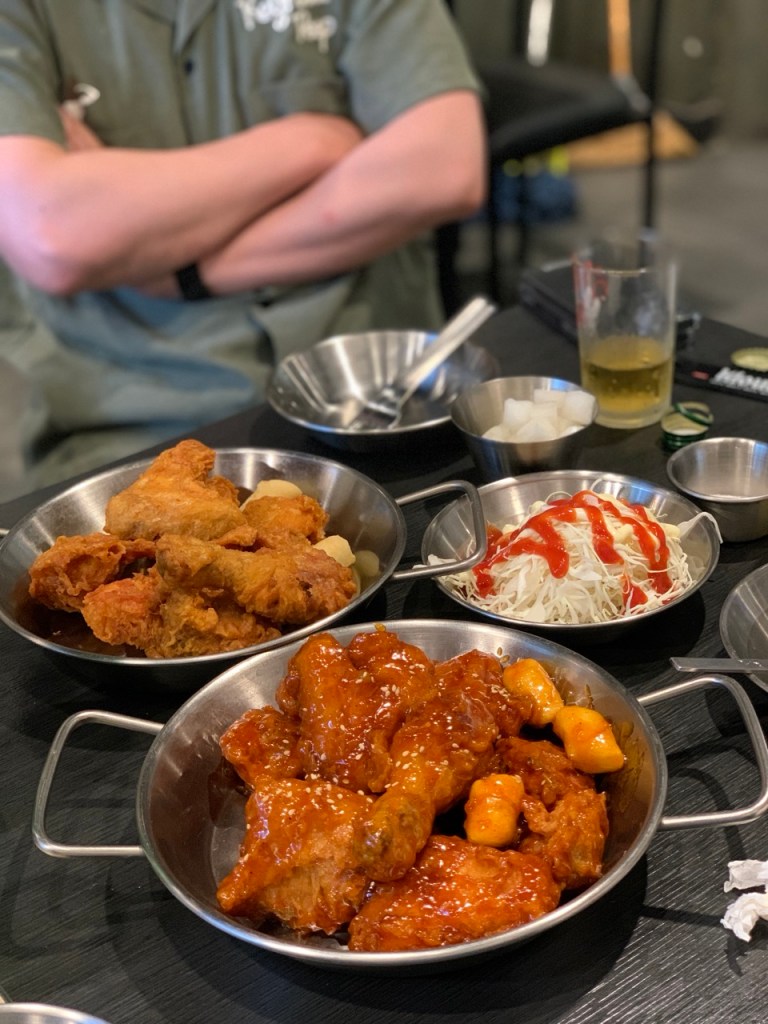 A platter of half original crispy chicken and half spicy glazed chicken.