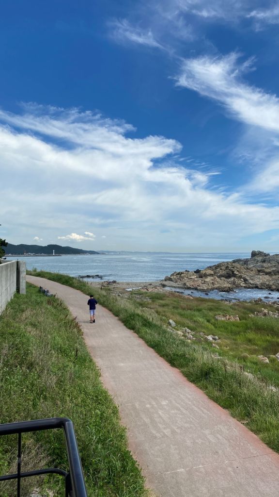The scenic trail leading to the cafe along the rugged cliffs of Gijang.