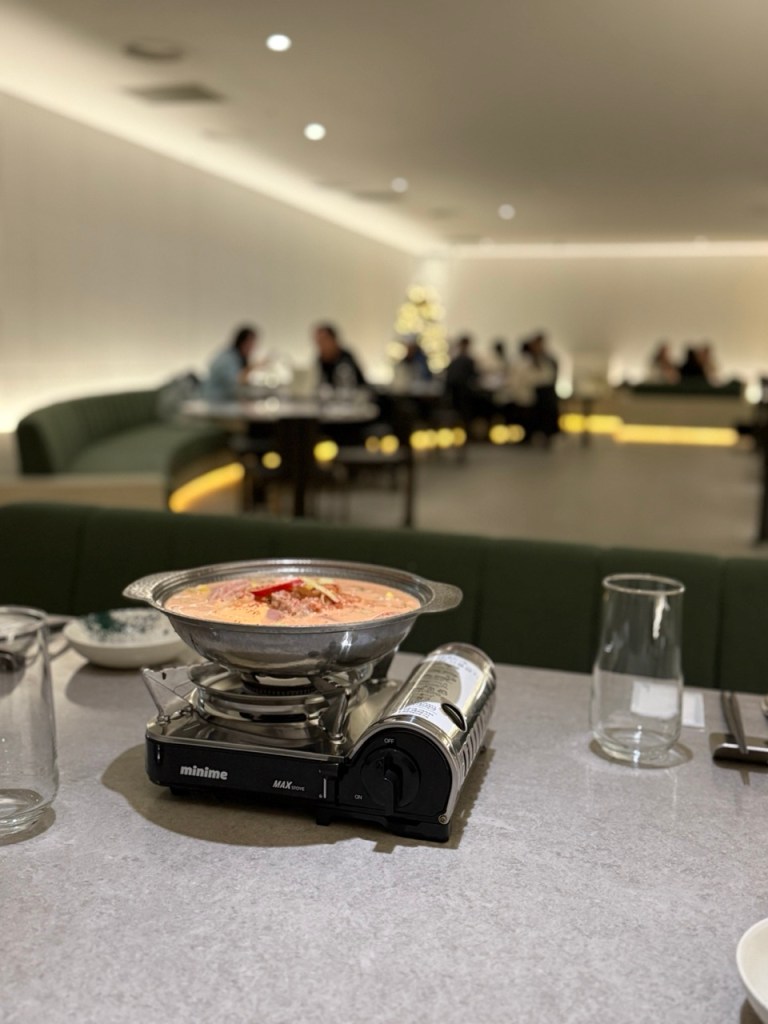 A cozy, aesthetic snapshot capturing the unique urban and luxurious atmosphere of the venue.