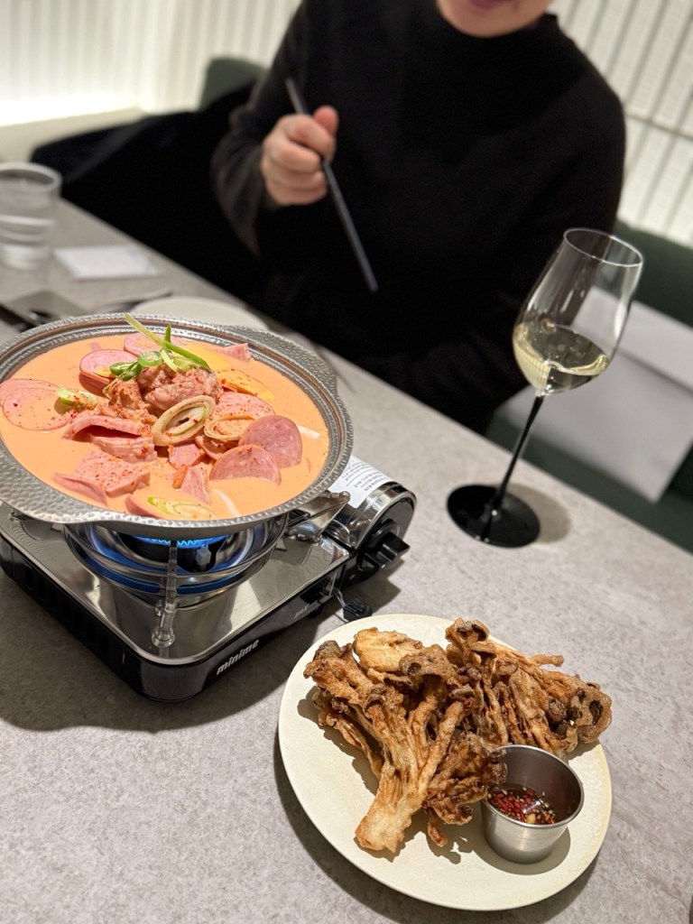 Aesthetic and minimalist plating of the modern Budae-jjigae at MOWa.