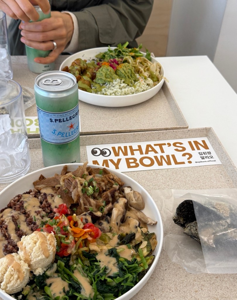 Mixing the colorful variety of toppings and grains for a balanced and healthy bite.