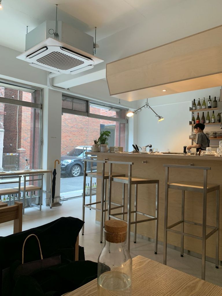 The sophisticated and artistic interior design of Yoho, perfect for a chic meal.