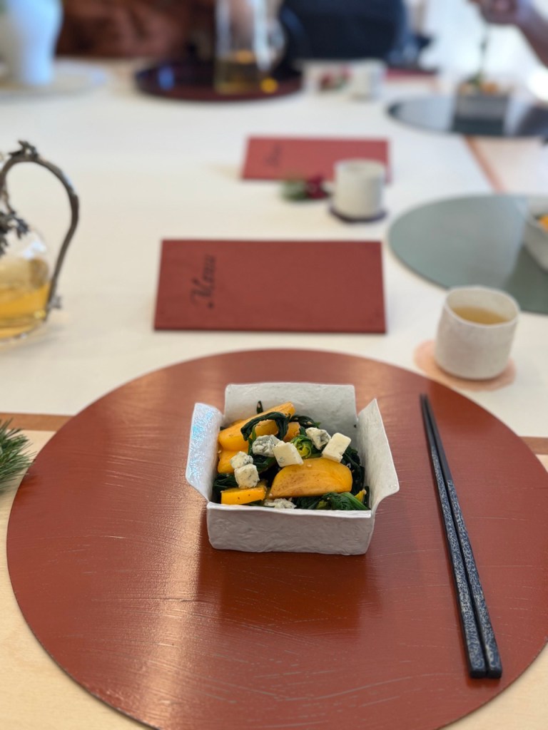 A high-end gourmet Korean meat dish served with artisan local herbs, showcasing masterful culinary execution.