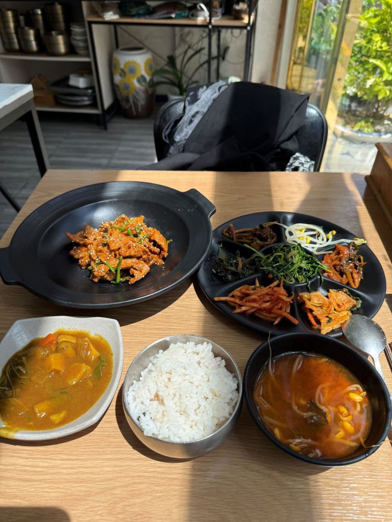 A glimpse into Korean daily life through a typical office worker's lunch table filled with diverse banchan.