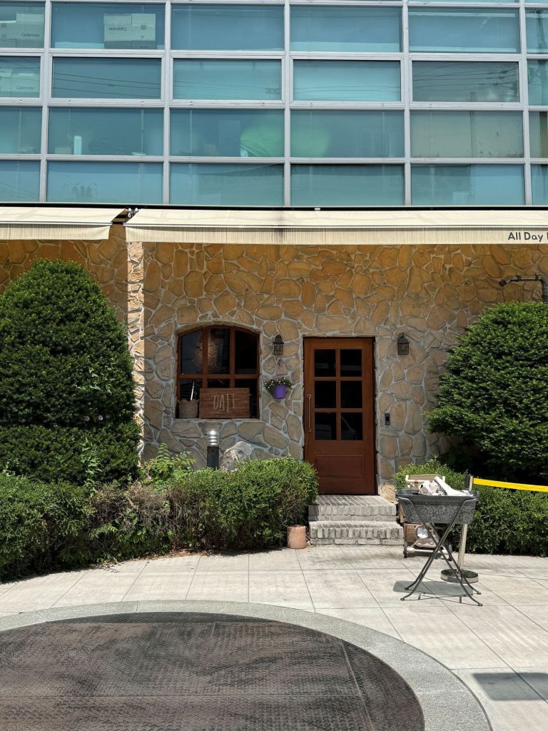 The charming and cozy exterior of Cafe OATT, a beautiful house-turned-cafe near Seoul Forest.