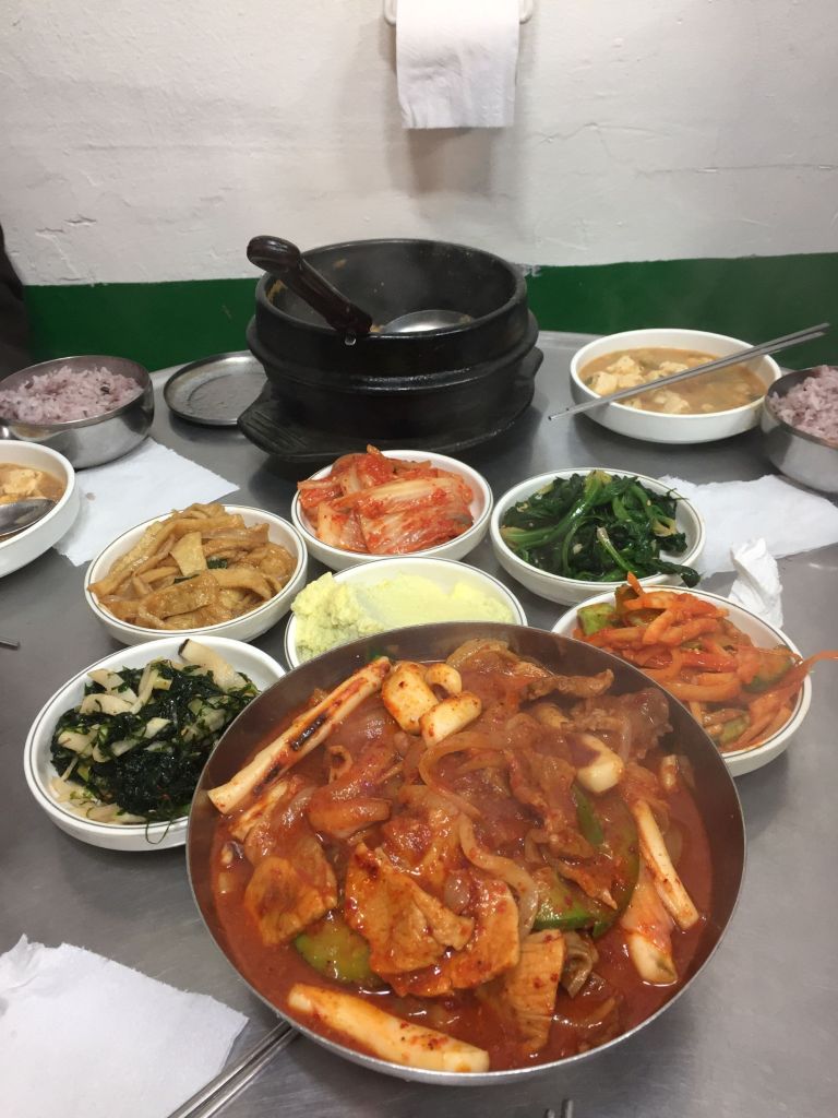 Real-life K-drama style home meal table with colorful side dishes, just like the scenes in popular Korean series.