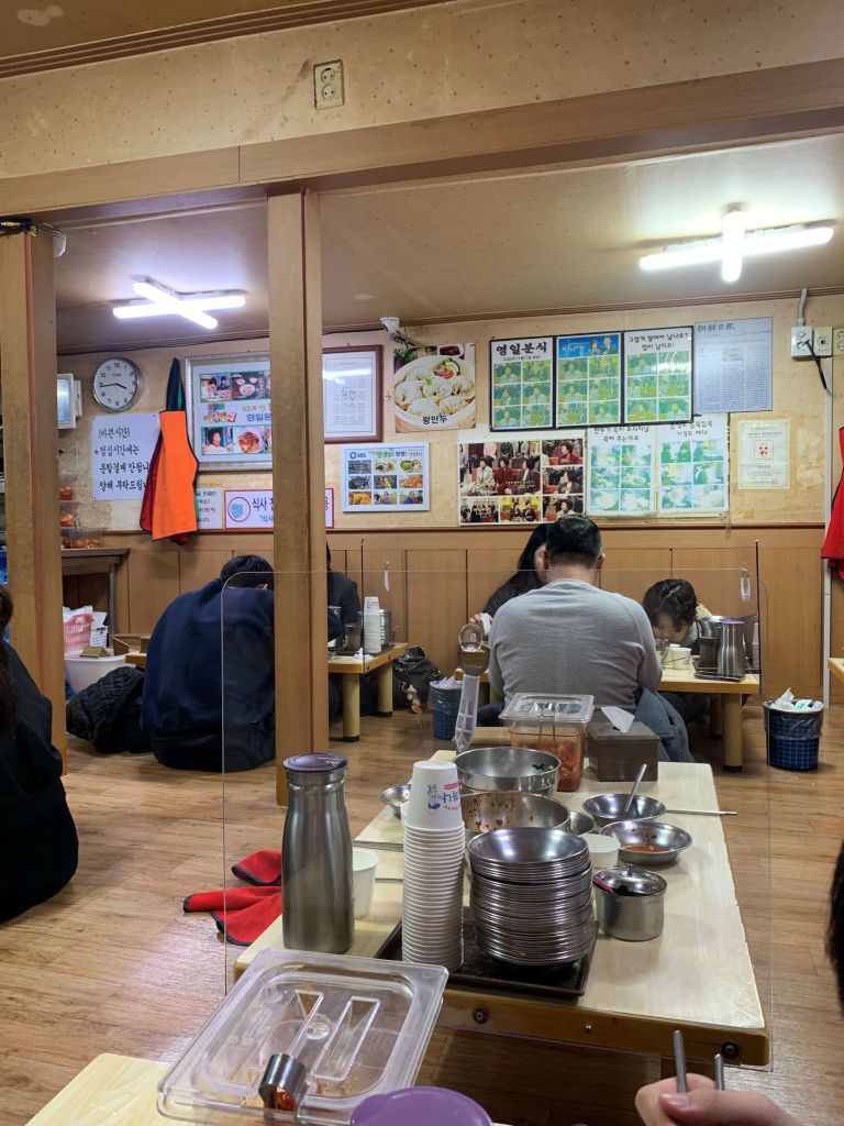 Interior view of a local favorite noodle shop located in Mullae Art Village, popular for its authentic taste.