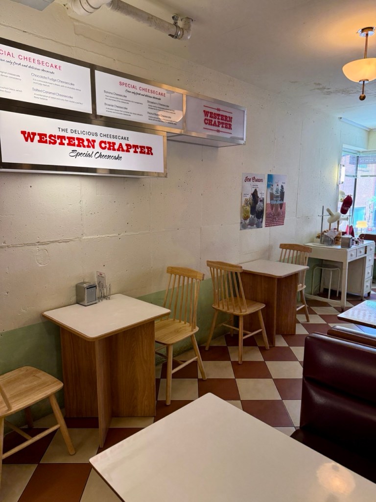 An aesthetic focus on the authentic retro American ornaments and collectibles decorating the wooden shelves.