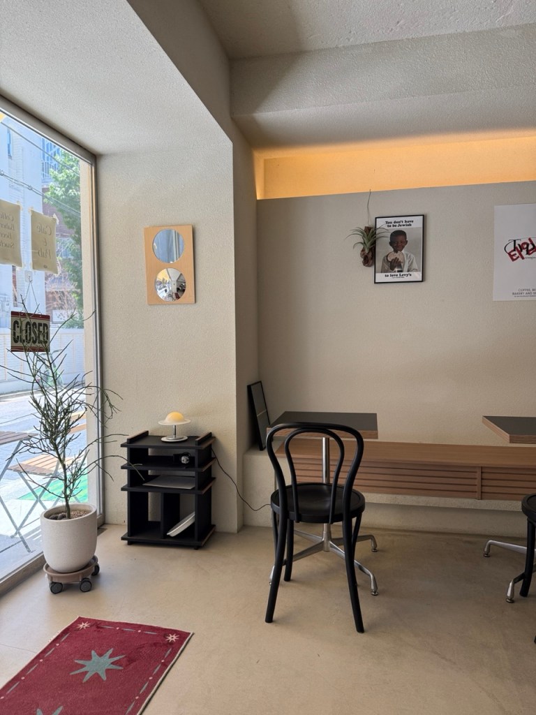 A warm lifestyle snapshot capturing young professionals and digital nomads working over coffee at Types.