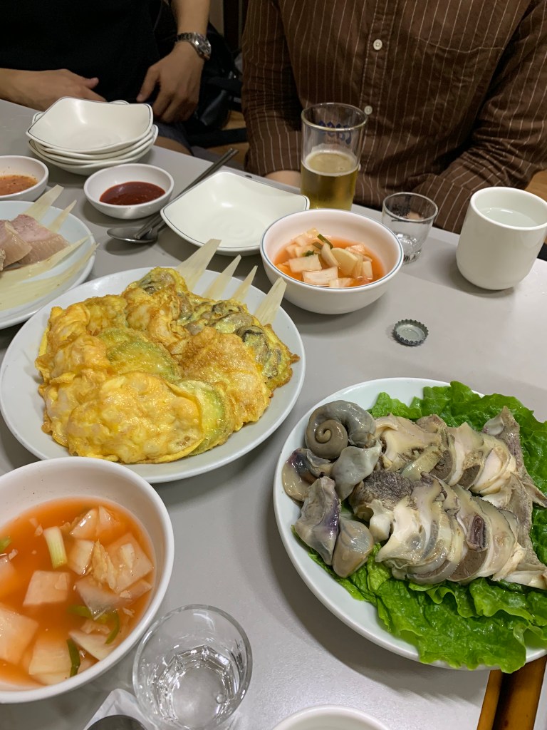 A detailed focus on the luxury delicate shrimp pancakes, beautifully pan-fried to a perfect golden