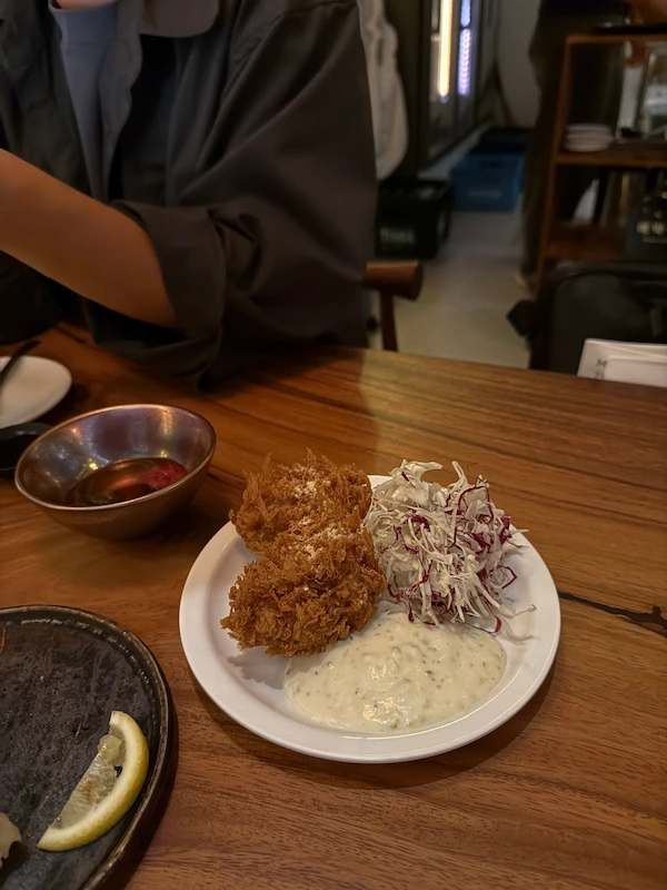 juicy minced meat cross-section inside a golden Menchi-katsu cutlet.